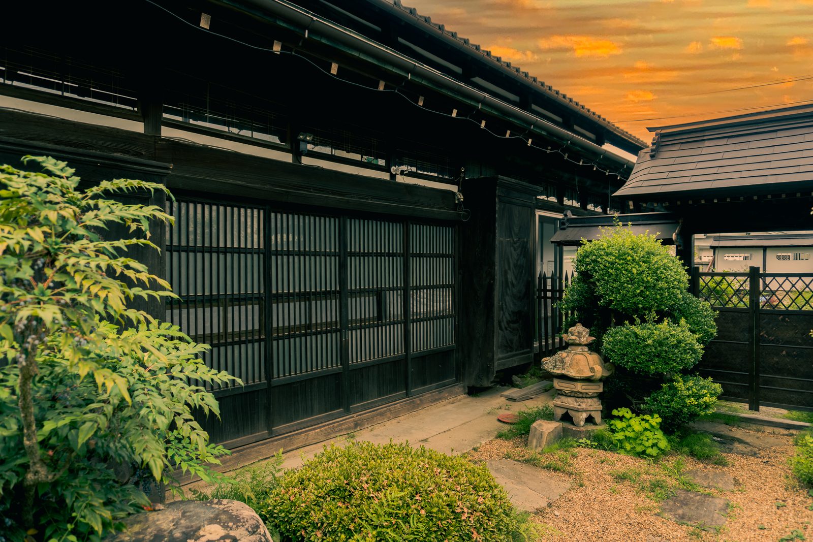 The house and garden at dusk