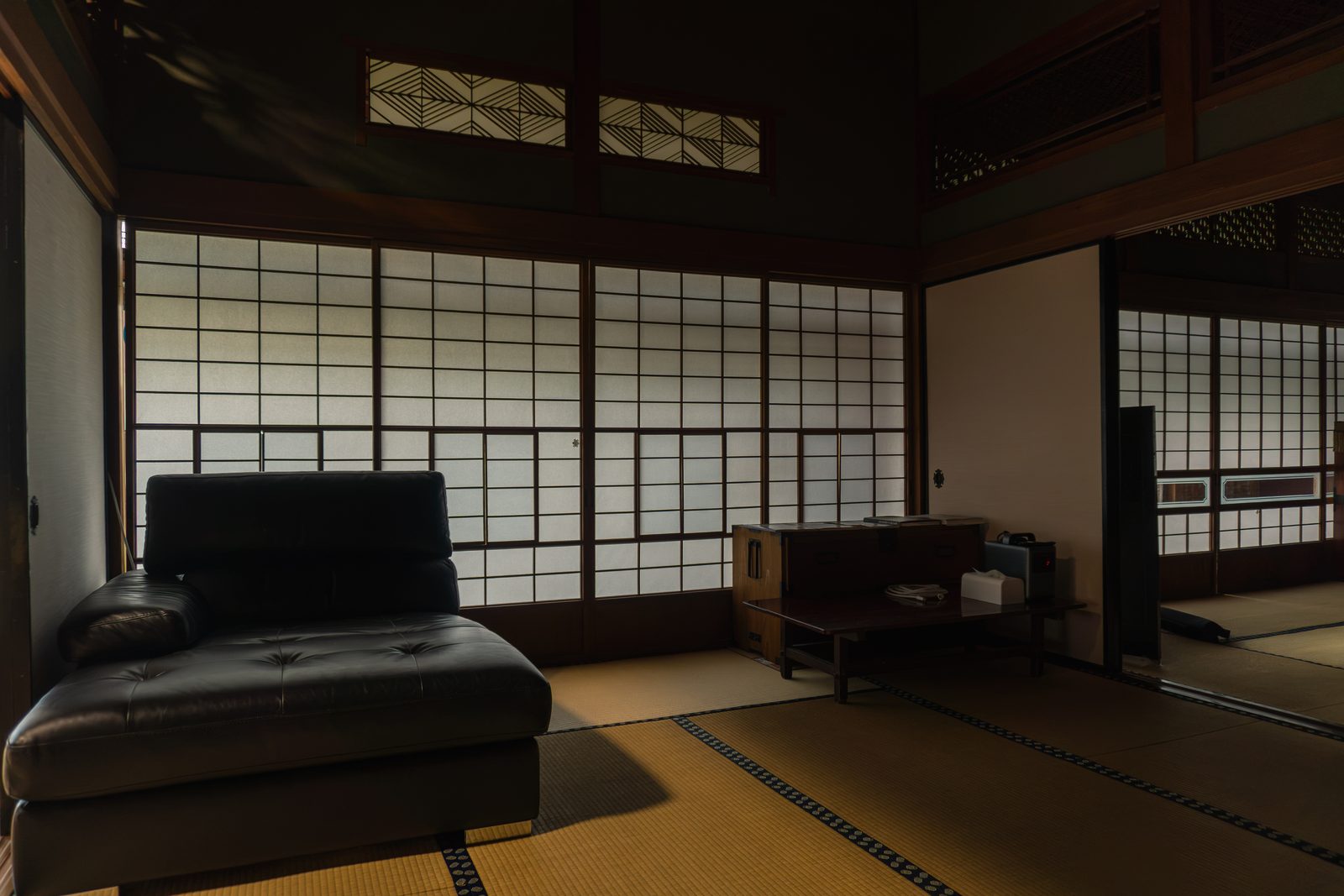 Tatami room with a leather sofa